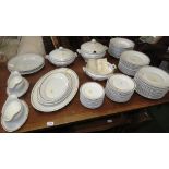 GERMAN PORCELAIN DINNER SERVICE, WHITE GROUND WITH GOLD BORDER, INCLUDING LIDDED TUREENS AND OVAL