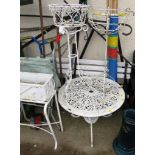 WHITE PAINTED WROUGHT METAL CIRCULAR GARDEN TABLE AND TWO PLANT STANDS