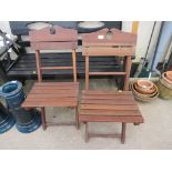 TWO WOODEN FOLDING GARDEN CHAIRS