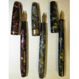 MABIE TODD 'SWAN' SELF-FILLER FOUNTAIN PEN WITH 14-CARAT GOLD NIB AND GREEN MARBLED BARREL AND