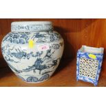 LARGE POTTERY LIDDED OVOID JAR DECORATED WITH ORIENTAL SCENES AND PIERCED CERAMIC PLANT HOLDER