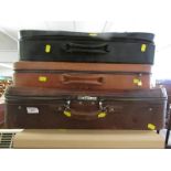 THREE LEATHER TRAVEL CASES