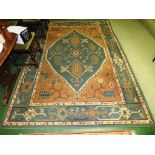 LARGE RECTANGULAR PALE GREEN GROUND FLOOR RUG WITH THREE MARGINS AND LARGE CENTRAL MEDALLION