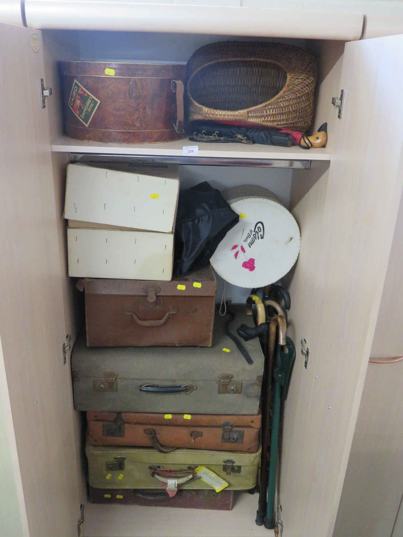 VINTAGE TRAVEL CASES, HAT BOXES, WALKING STICKS, UMBRELLAS AND WICKER BASKET (CONTENTS OF ONE
