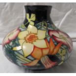 Moorcroft pottery QEII Golden Jubilee large squat vase, dark blue ground, tube lined decoration of