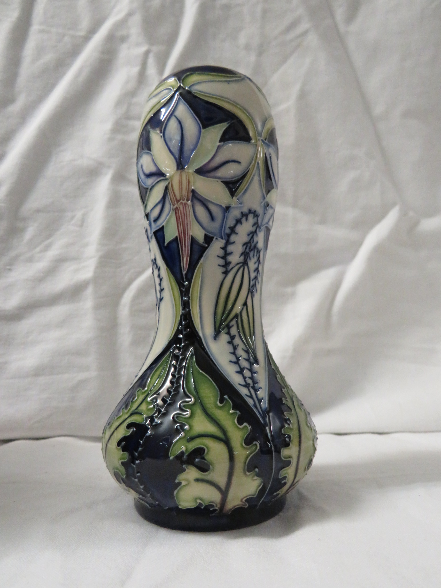 Moorcroft pottery Meadow Star baluster vase with bulbous neck, dark blue ground, tube lined - Image 3 of 4