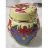 Moorcroft enamel miniature ginger jar with cover, cream ground patterned with honeysuckle and blue