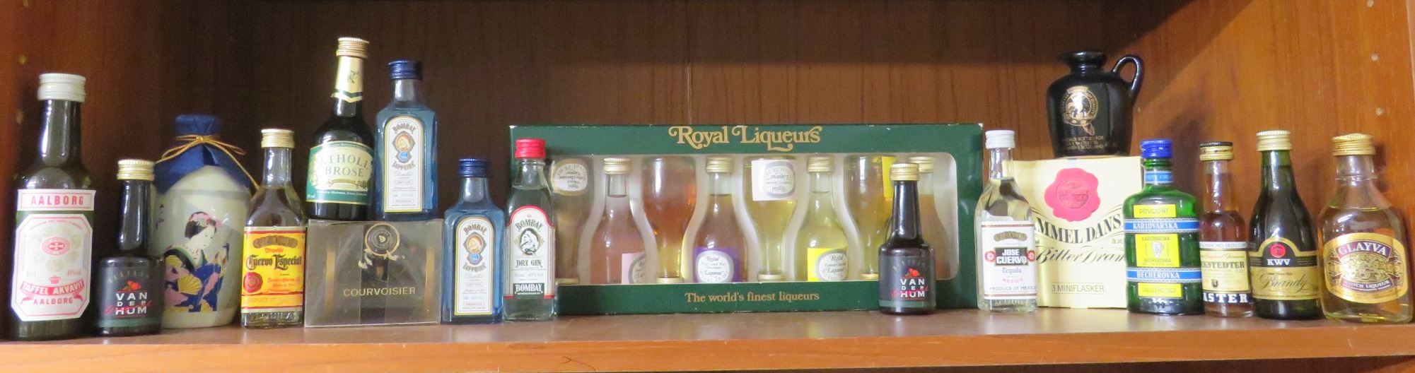 Selection of miniatures including Royal Liqueurs presentation pack, two bottles of Bombay Sapphire