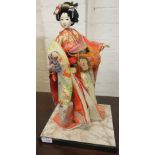 Modern decorative figure of geisha, height 41cm, on a square base