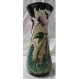 Moorcroft pottery four star members baluster vase, buff ground, black at neck and foot, tube lined