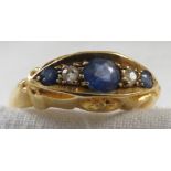 18-carat gold sapphire and diamond ring, the central largest sapphire (round cut diameter 4mm) set