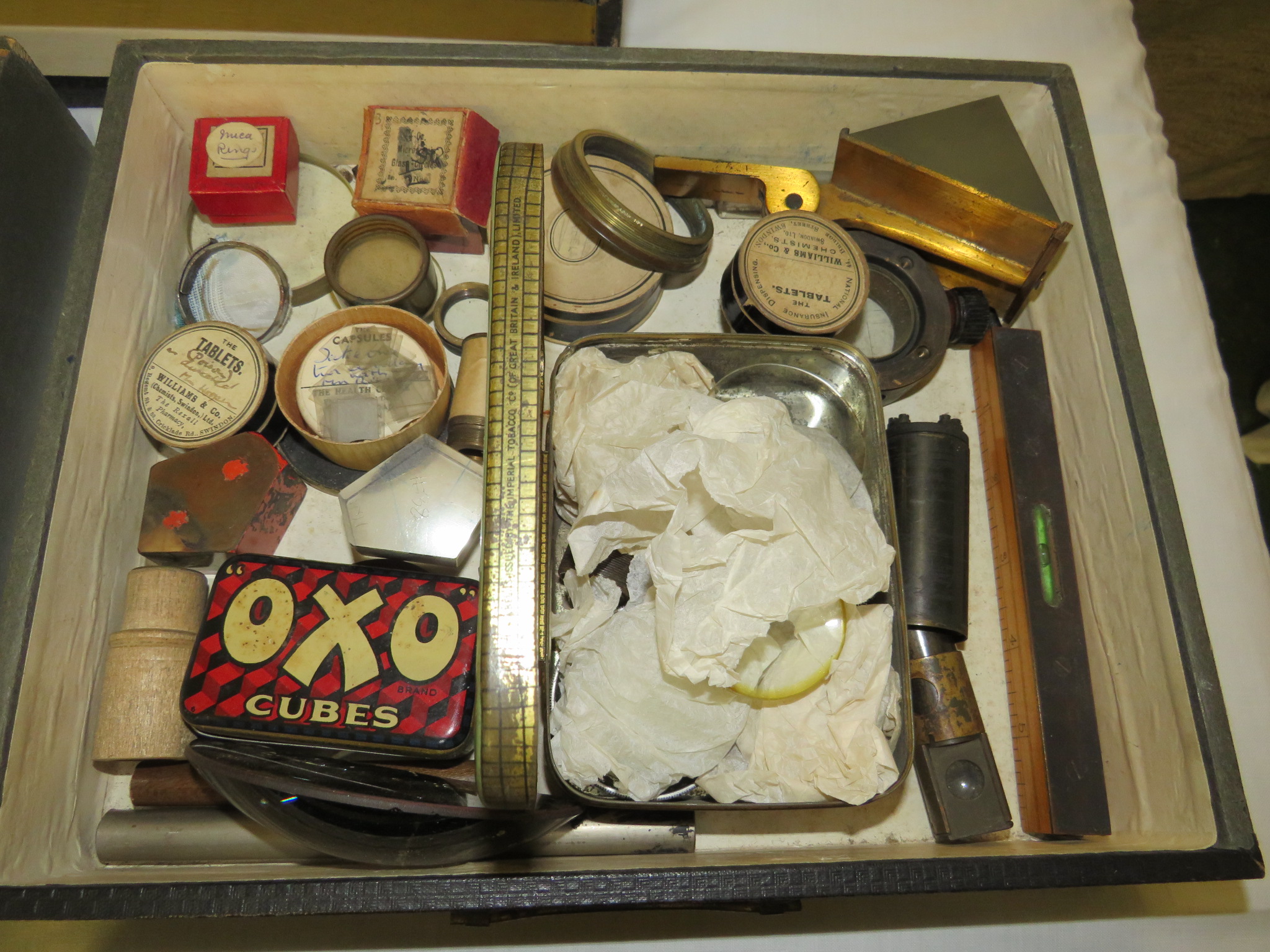 An assortment of optical components including gun sight parts contained in a vintage Advance 'The - Image 4 of 5
