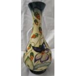 Moorcroft pottery one star members vase of bottle shape, cream ground, green at neck and foot,