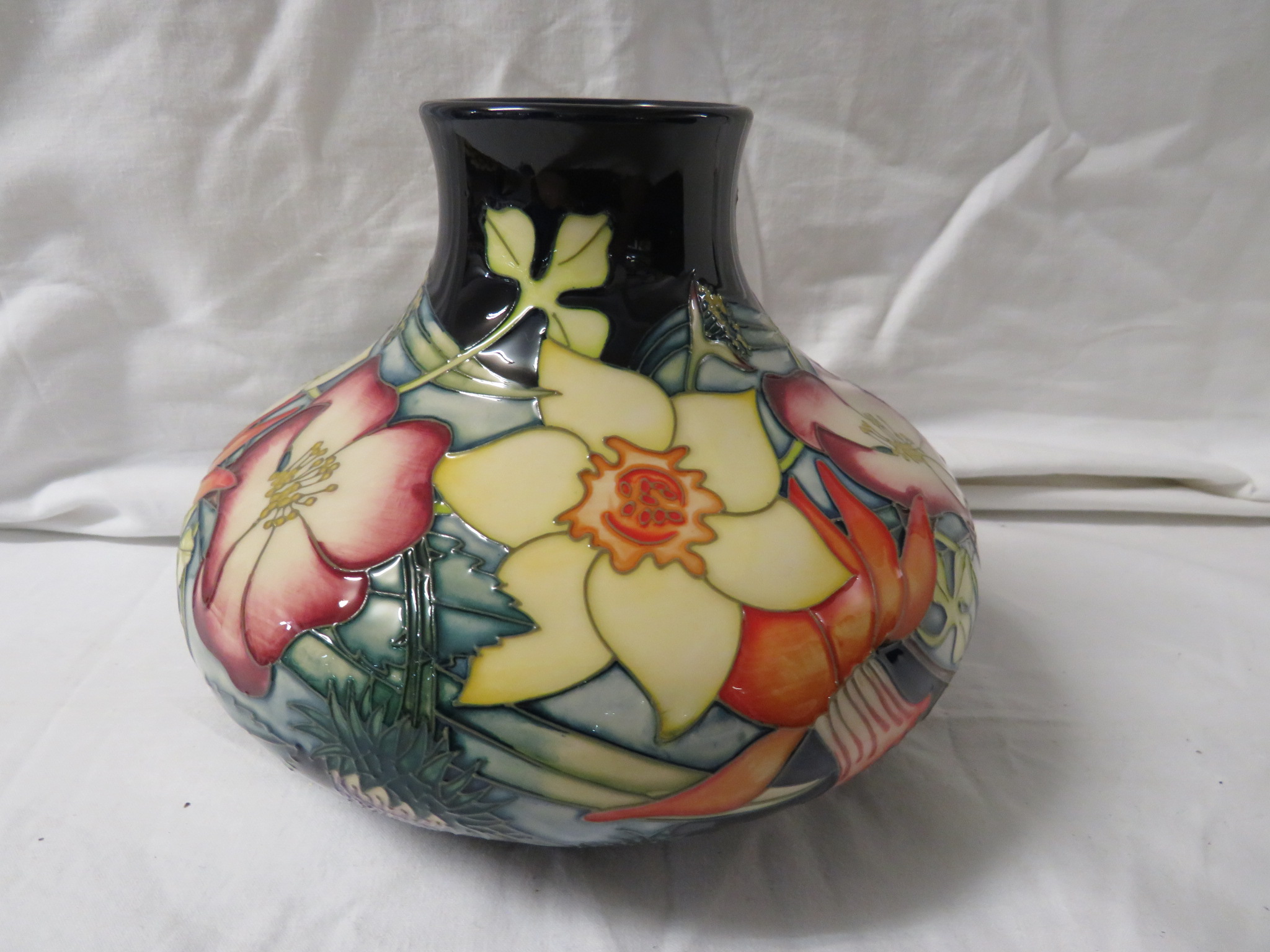 Moorcroft pottery QEII Golden Jubilee large squat vase, dark blue ground, tube lined decoration of - Image 4 of 5