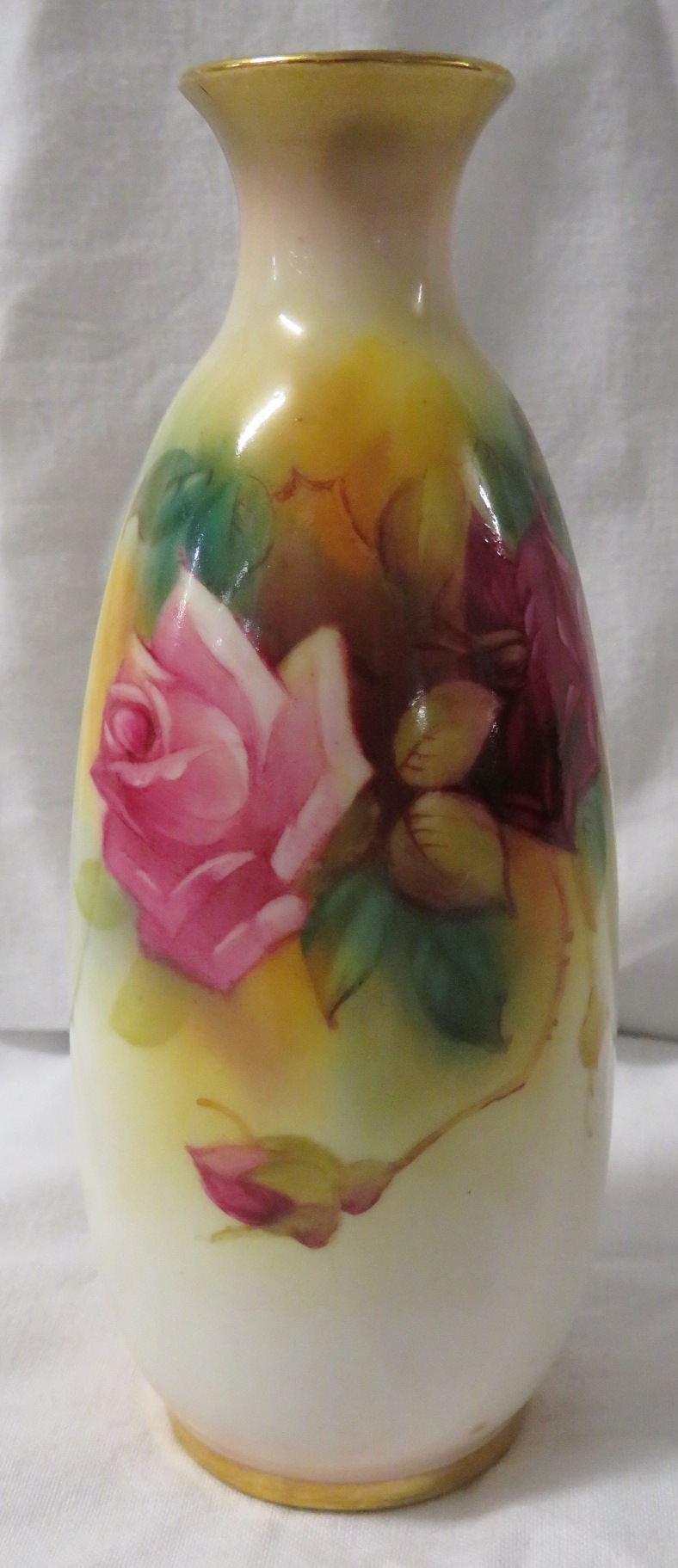 Royal Worcester porcelain vase, slender ovoid form, hand painted decoration of pink roses, signed