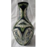 Moorcroft pottery Rain Daisy one star members vase of baluster form, dark blue ground with tube