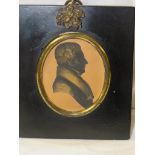 Painted oval portrait miniature of gentleman, head and shoulders enhance silhouette, signed to