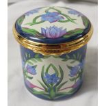 Moorcroft enamel cylindrical pill box with hinged lid, blue ground and cream with panels of blue