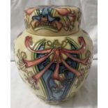 Moorcroft pottery ginger jar with cover, cream ground, tube lined decoration of honeysuckle and