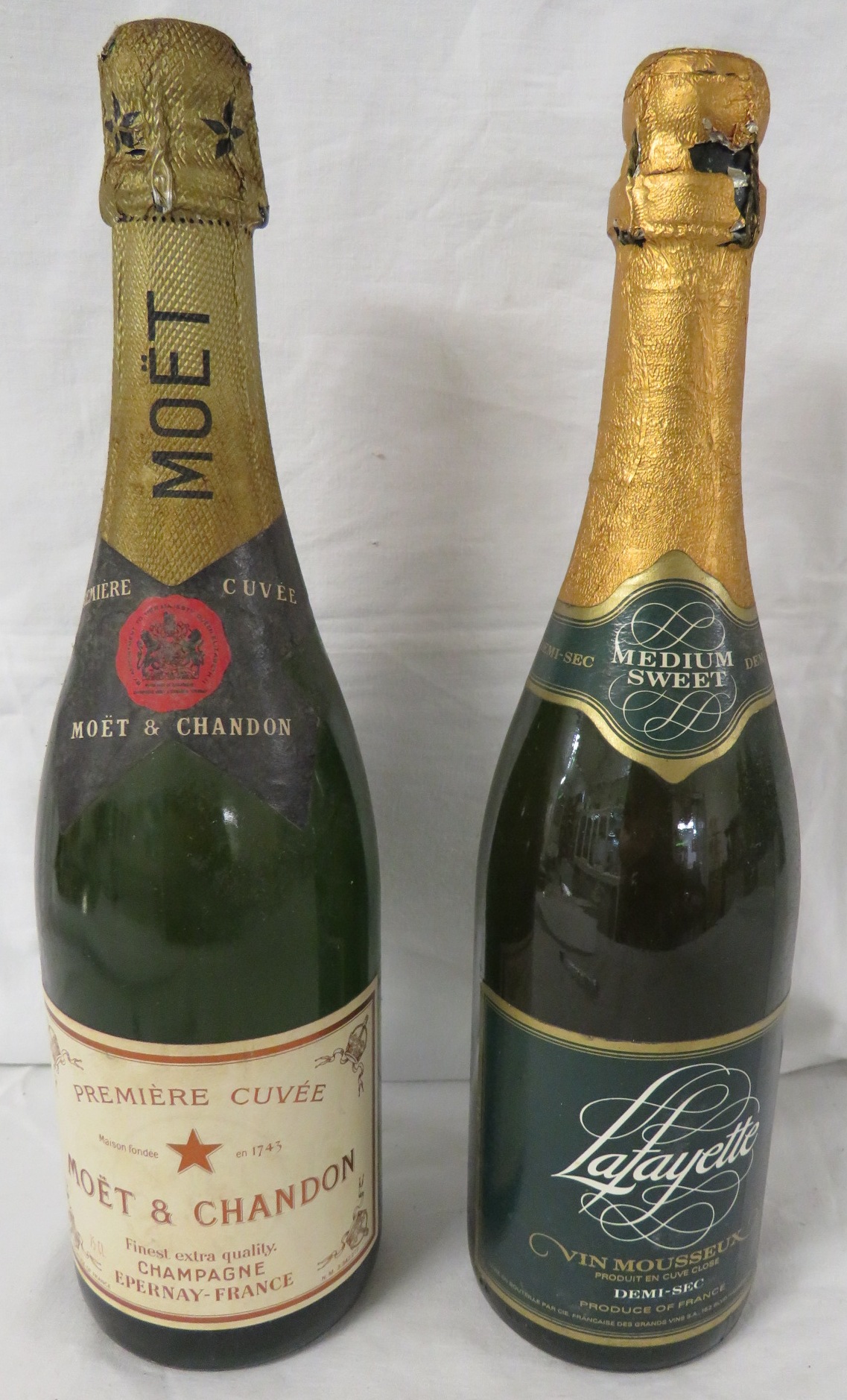 Bottle of Moet & Chandon Premiere Cuvee finest extra quality champagne 75cl and bottle of