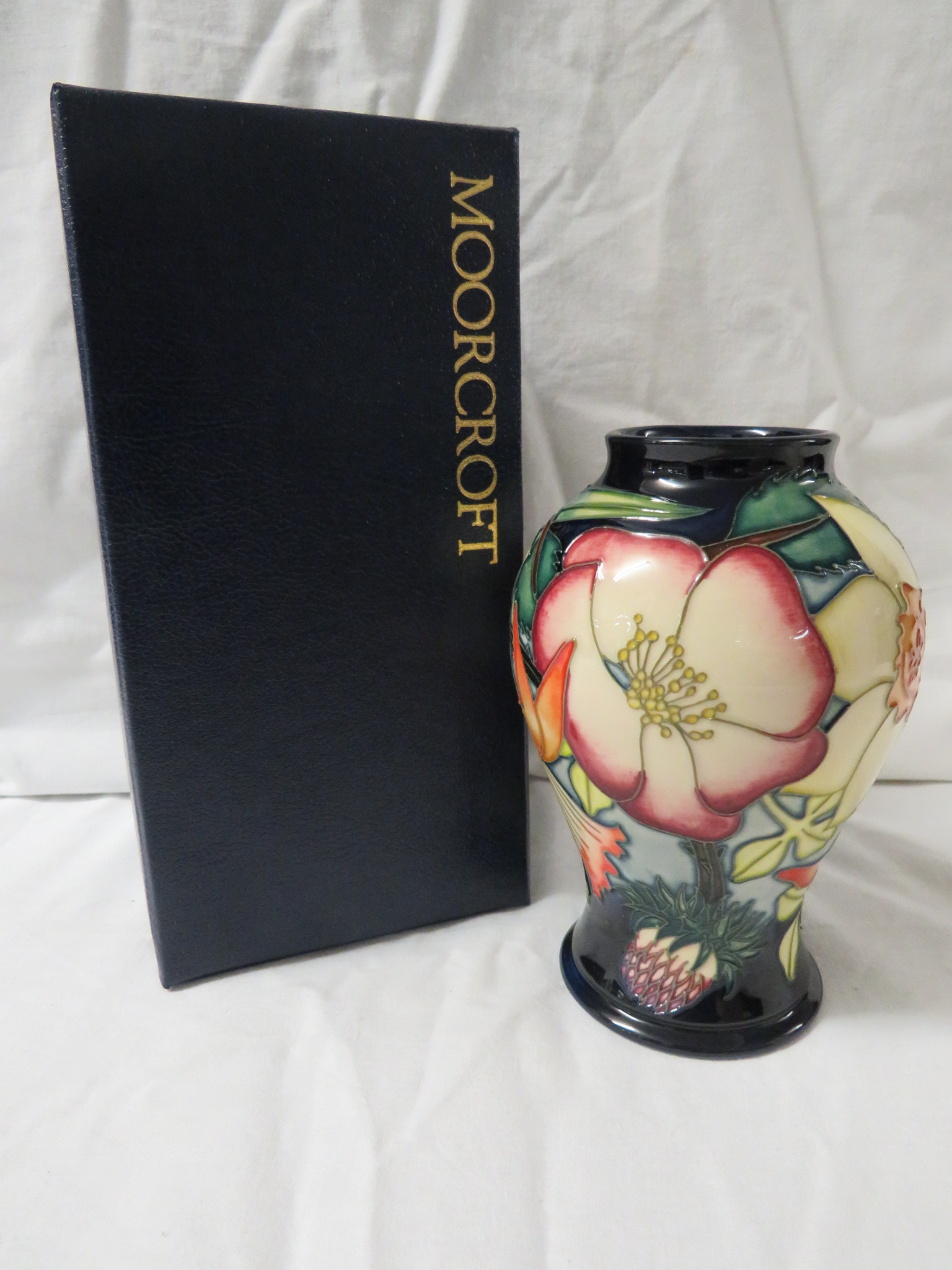 Moorcroft pottery QEII Golden Jubilee baluster vase, dark blue ground, tube lined decoration of - Image 2 of 4