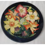 Moorcroft pottery QEII Golden Jubilee plate, dark blue ground, tube lined decoration of variously