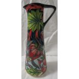 Moorcroft pottery two star members ewer of tapering cylindrical form with angular handle, dark