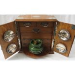 Oak smoker's cabinet with silver plated mounts, 1920 engraved presentation escutcheon, interior with