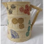 Royal Worcester Aesthetic style jug with Japanese emblems, handle moulded as wood, green factory