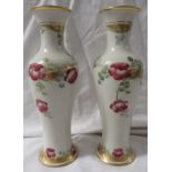 A pair of William Moorcroft Macintyre slender baluster vases, cream ground with pink flowers and