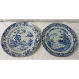 An octagonal Chinese blue and white porcelain plate painted with houses in landscape and a patterned