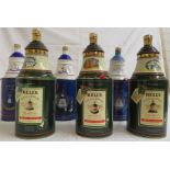 Three boxed Wade Bell's Scotch whisky Christmas decanters (1989, 1990 and 1991), 75cl; boxed Wade