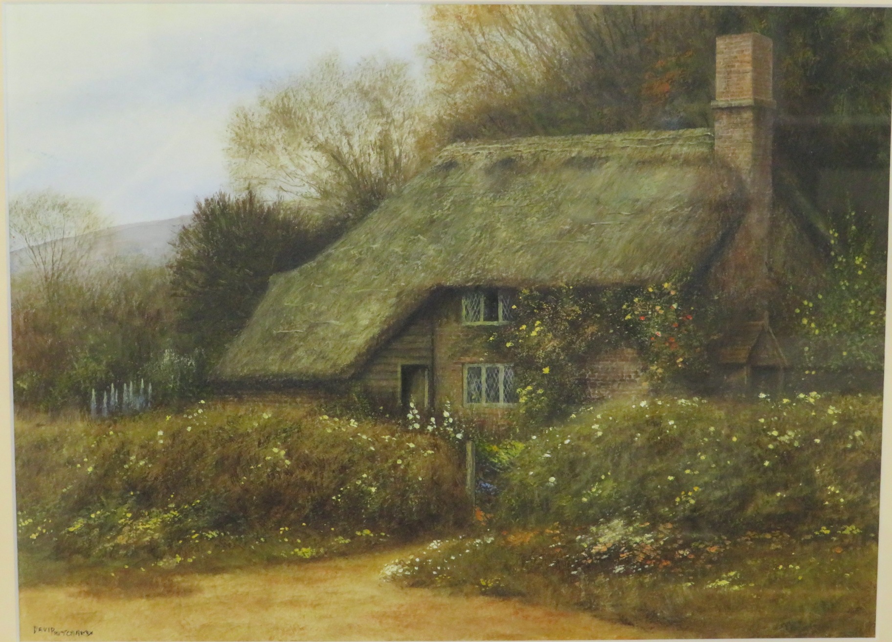 David Pritchard - thatched cottage with flower garden and hill beyond, watercolour, signed lower