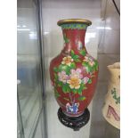 CLOISONNE RED GROUND ENAMEL BALUSTER VASE WITH FOLIATE DECORATION (HEIGHT 23CM) WITH CARVED WOODEN