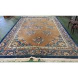 LARGE BLUE GROUND CHINESE STYLE EMBOSSED FLOOR RUG WITH TASSELLED ENDS (APPROXIMATELY 375CM X