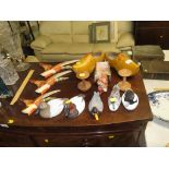 TREEN WARE INCLUDING GRADUATED DUCKS IN FLIGHT, PAIR OF CLOGS, BONDED WOODEN SCULPTURES OF WATERFOWL