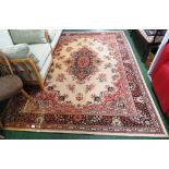 CREAM GROUND RECTANGULAR FLOOR RUG, PALE RED PATTERN AND CENTRAL MEDALLION