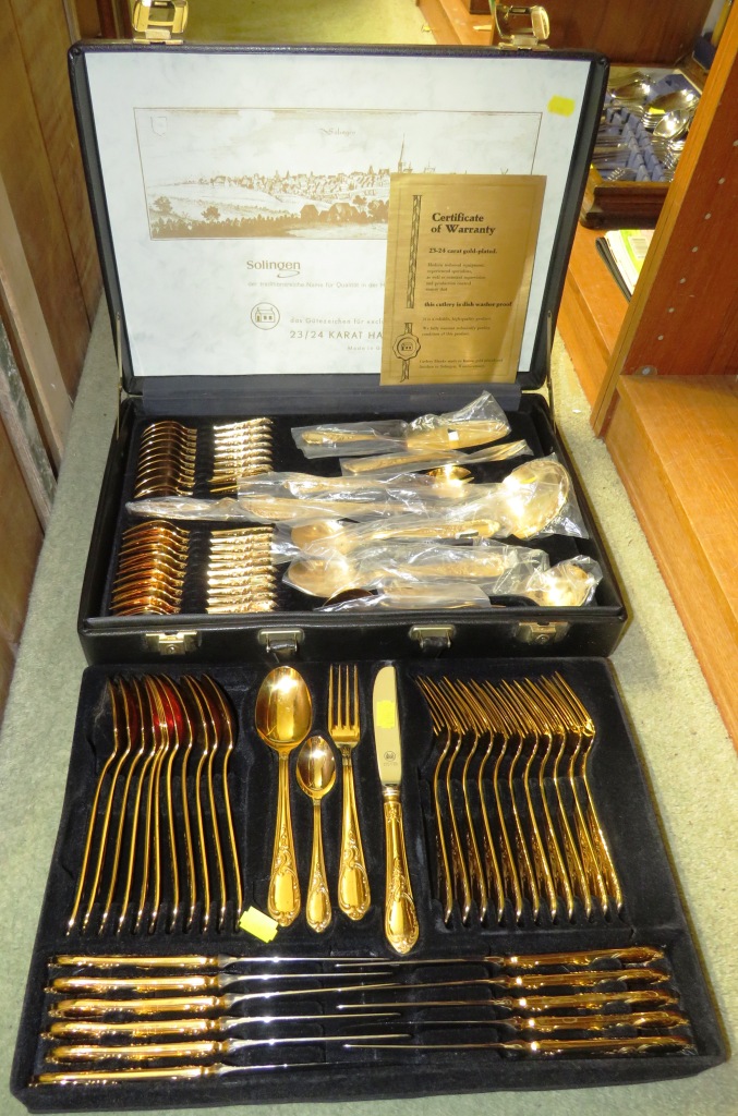 SEVENTY PIECE CANTEEN OF 23/24-CARAT GOLD PLATED CUTLERY, SOLINGEN, GERMAN MADE, PRESENTED IN FITTED