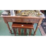 OAK HALL TABLE WITH CARVED GALLERIED BACK AND TWO DRAWERS WITH CARVED FACES