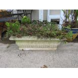 TWO LARGE COMPOSITE STONE GARDEN TROUGHS WITH CONTENTS