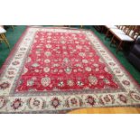 LARGE RED AND CREAM GROUND FOLIATE PATTERNED FLOOR RUG (APPROXIMATELY 360CM X 270CM)