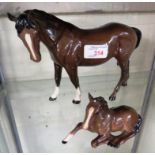 BESWICK CHESTNUT MARE AND BESWICK SEATED FOAL