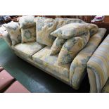 ALSTONS THREE SEATER SOFA IN FLORAL PATTERNED UPHOLSTERY WITH MATCHING SCATTER CUSHIONS