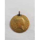 George III 1806 half guinea, drilled with base metal pendant ring