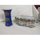 Crown Staffordshire vase of flared form, blue ground with gilding of vases and flowers, height 21.