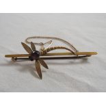 Mayfly bar brooch, round cut amethyst body and two garnet eyes, yellow metal stamped 9CT, 64mm x