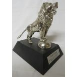 Replica nickel plated Graf & Stift car mascot mounted on a stained black wooden plinth, labelled