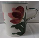 Wemyss Ware tankard painted with red and pink flowers and green leaves, height 14.5cm, the base
