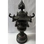 A Far Eastern bronze alloy and enamel table oil lamp with partial conversion for electricity,