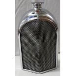 Ruddspeed Ltd decanter modelled as a Bentley motor car radiator grille, chromium plated and red